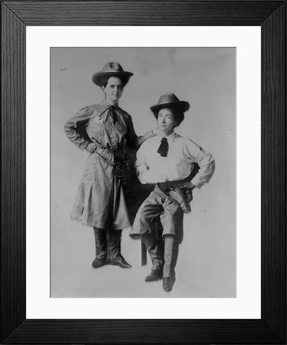Framed Print : Mrs. Bessie Jenkins and Mrs. Cary Seely dressed up in cowboy outfits, 1910. Creator: Bain News Service Framed Print : Mrs. Bessie Jenkins and Mrs. Cary Seely dressed up in cowboy outfits, 1910. Creator: Bain News Service