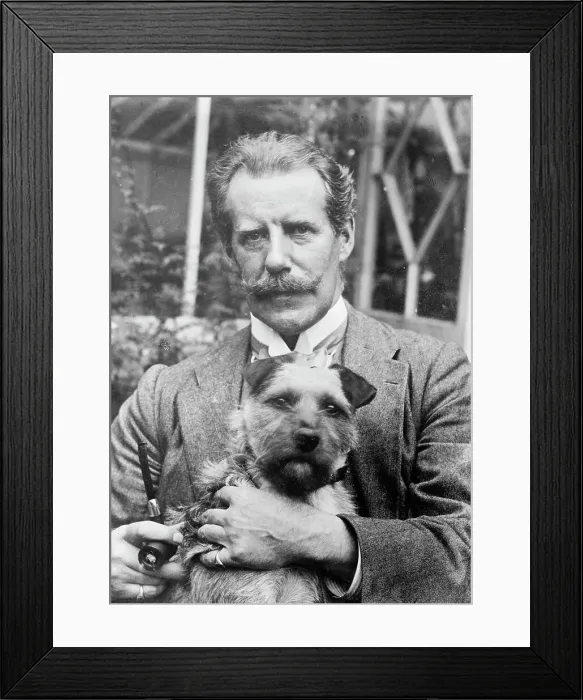 Framed Print : Bernard M. Partridge holding dog, 1910. Creator: Bain News Service Framed Print : Bernard M. Partridge holding dog, 1910. Creator: Bain News Service