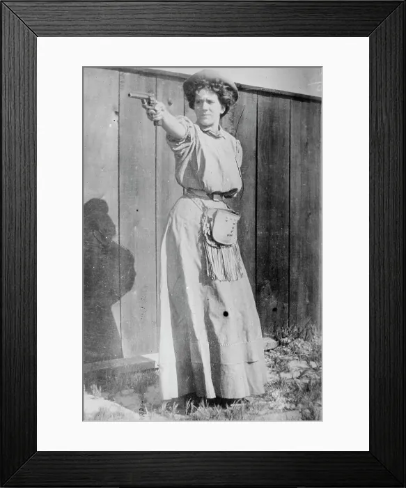 Framed Print : Mrs. Adolph Topperwein. [with gun], between c1910 and c1915. Creator: Bain News Service