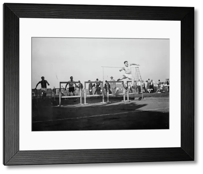 Framed Print : J.J. Eller wins 120 yd. Hurdle 1911, 1911. Creator: Bain News Service Framed Print : J.J. Eller wins 120 yd. Hurdle 1911, 1911. Creator: Bain News Service