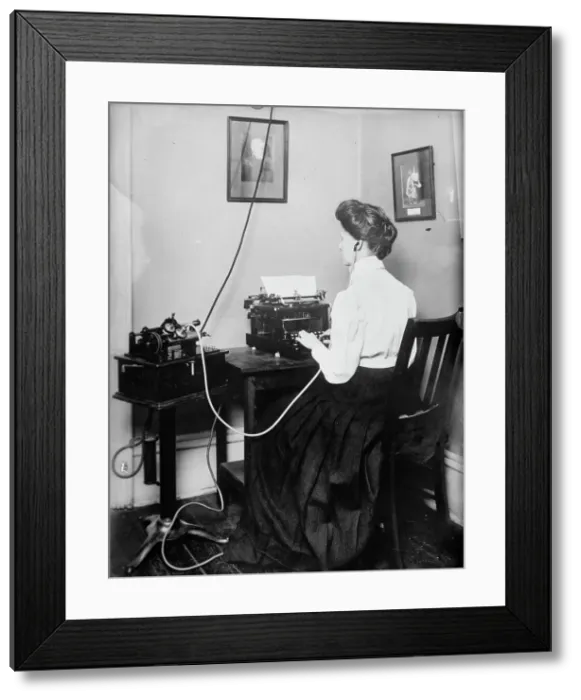 Framed Print : Blind stenographer using dictaphone, 1911. Creator: Bain News Service Framed Print : Blind stenographer using dictaphone, 1911. Creator: Bain News Service