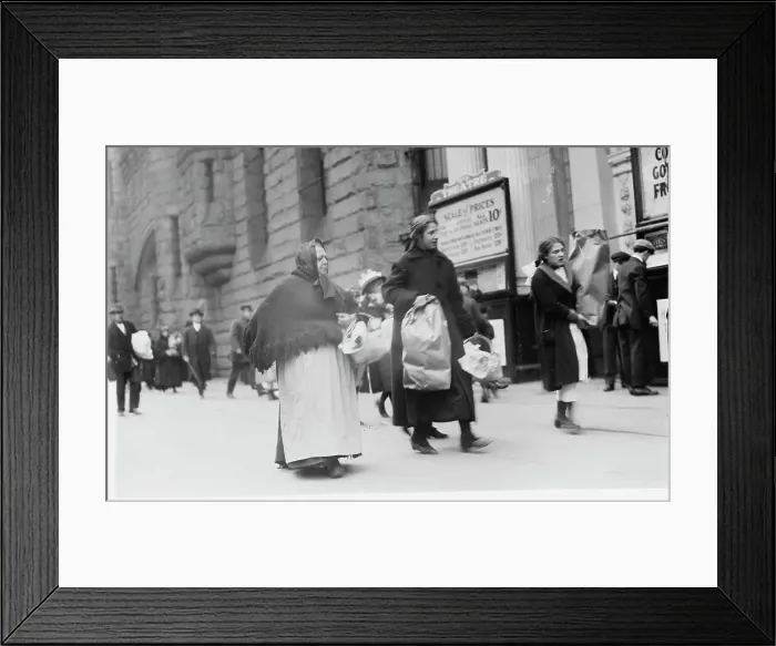 Framed Print : Carrying home Xmas baskets, between c1910 and c1915. Creator: Bain News Service Framed Print : Carrying home Xmas baskets, between c1910 and c1915. Creator: Bain News Service
