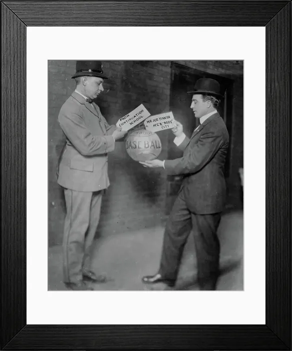 Framed Print : Joe Tinker receiving medicine ball sent by Continuation School 1913, 1913. Creator: Bain News Service Framed Print : Joe Tinker receiving medicine ball sent by Continuation School 1913, 1913. Creator: Bain News Service