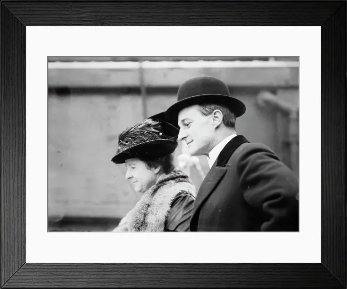 Framed Print : F.J. Shepard and wife departing, 1913. Creator: Bain News Service Framed Print : F.J. Shepard and wife departing, 1913. Creator: Bain News Service