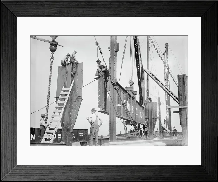 Framed Print : Putting 46 ton girder in place - Cons. Gas Co's Bldg. 1913. Creator: Bain News Service Framed Print : Putting 46 ton girder in place - Cons. Gas Co's Bldg. 1913. Creator: Bain News Service