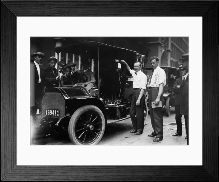 Framed Print : Inspector Walsh condemning taxicab, 1913. Creator: Bain News Service Framed Print : Inspector Walsh condemning taxicab, 1913. Creator: Bain News Service