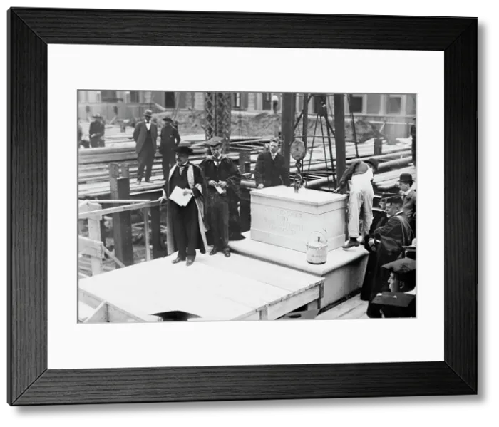 Framed Print : Laying cornor [i.e. corner] stone, Columbia. Pres. Butler & Dean Wheeler, 1911. Creator: Bain News Service