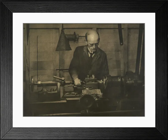 Framed Print : Untitled (Industry; man working lathe), 1920s. Creator: AJ Wales Framed Print : Untitled (Industry; man working lathe), 1920s. Creator: AJ Wales