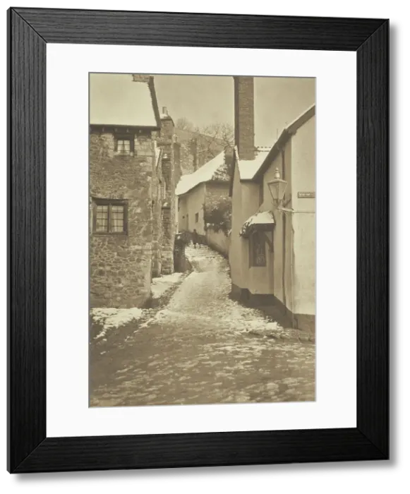 Framed Print : [Snow on roofs, alleyway]. From the album: Photograph album - England, 1920s. Creator: Harry Moult