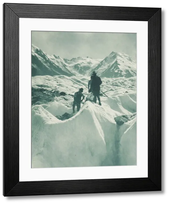 Framed Print : On the Tasman Glacier, Mt Cook district. From the album: Record Pictures of New Zealand, 1920s. Creator: Harry Moult