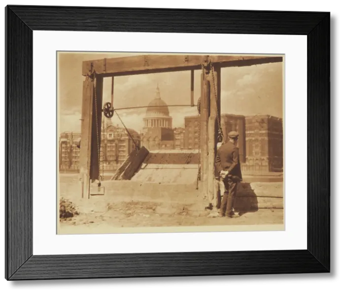 Framed Print : [Man on riverbank]. From the album: Photograph album - London, 1920s. Creator: Harry Moult