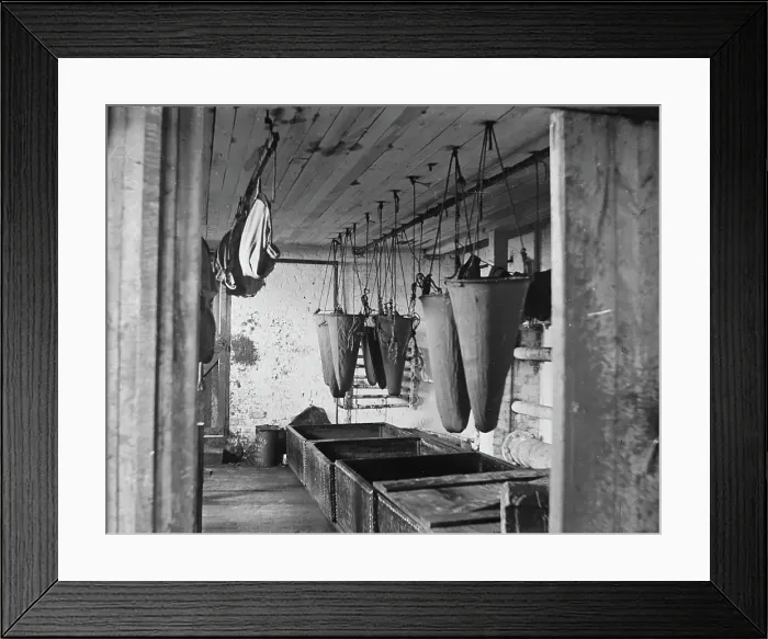 Framed Print : In the refining room filtering sea elephant oil, c1895. Creator: Unknown Framed Print : In the refining room filtering sea elephant oil, c1895. Creator: Unknown