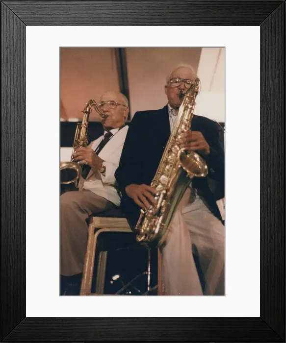 Framed Print : Flip Phillips and Jerry Jerome, The March of Jazz, Clearwater Beach, Florida, 1997. Creator: Brian Foskett Framed Print : Flip Phillips and Jerry Jerome, The March of Jazz, Clearwater Beach, Florida, 1997. Creator: Brian Foskett