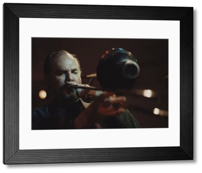 Framed Print : Urbie Green, Tenor Clef, London, 1991. Creator: Brian Foskett Framed Print : Urbie Green, Tenor Clef, London, 1991. Creator: Brian Foskett