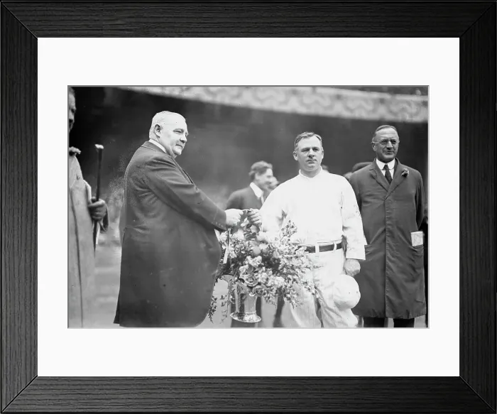 Framed Print : Edward McCall presents a silver basket of flowers to New York Giants manager John McGraw... 1913. Creator: Bain News Service Framed Print : Edward McCall presents a silver basket of flowers to New York Giants manager John McGraw... 1913. Creator: Bain News Service