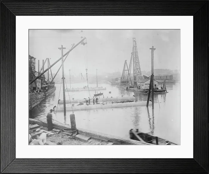 Framed Print : Tubes for subway line under Harlem River, being sunk, between c1910 and c1915. Creator: Bain News Service Framed Print : Tubes for subway line under Harlem River, being sunk, between c1910 and c1915. Creator: Bain News Service