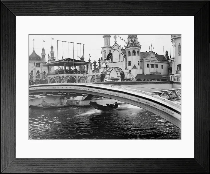Framed Print : Coney Island, in Luna Park; Wire walkers & the Chute Boat, between c1910 and c1915. Creator: Bain News Service Framed Print : Coney Island, in Luna Park; Wire walkers & the Chute Boat, between c1910 and c1915. Creator: Bain News Service