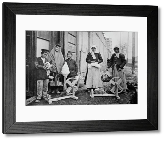Framed Print : Erivan : Taking home spinning wheels & cotton, between c1915 and c1920. Creator: Bain News Service