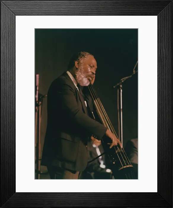 Framed Print : Cleveland Eaton, Count Basie Orchestra, Northampton, England, 1989. Creator: Brian Foskett