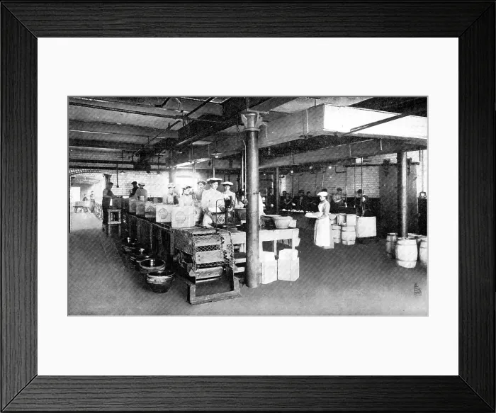 Framed Print : Where machinery is paramount: filling and weighing packages of lard, 1909. Creator: Unknown Framed Print : Where machinery is paramount: filling and weighing packages of lard, 1909. Creator: Unknown