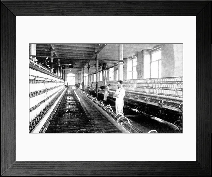 Framed Print : Spinning the cotton into yarn: a great spinning-mule in use, 1909. Creator: Unknown Framed Print : Spinning the cotton into yarn: a great spinning-mule in use, 1909. Creator: Unknown