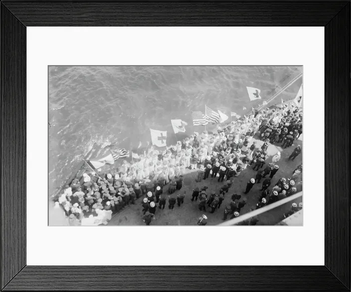 Framed Print : Flags greet Wilson, between c1915 and c1920. Creator: Bain News Service