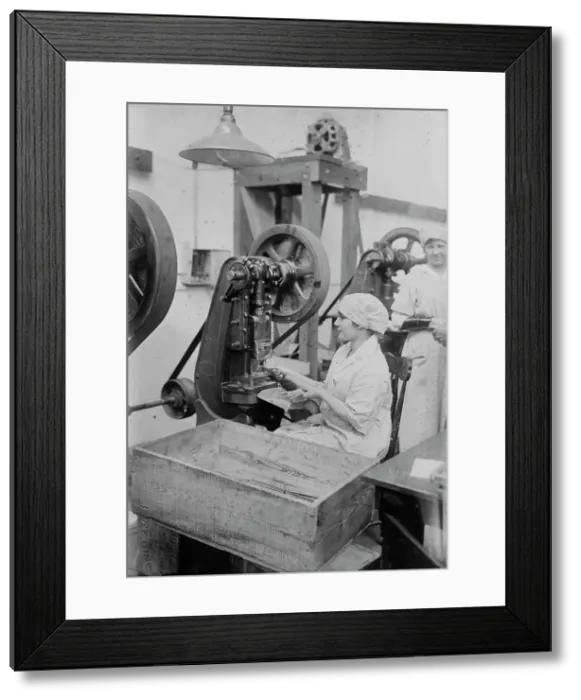 Framed Print : Crimping ignition tubes, between c1915 and c1920. Creator: Bain News Service Framed Print : Crimping ignition tubes, between c1915 and c1920. Creator: Bain News Service