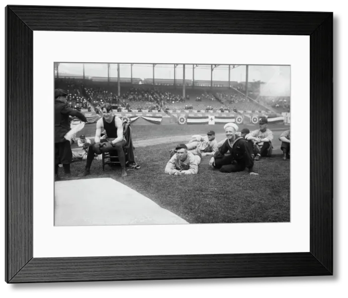 Framed Print : Boxer Joe Welling, amid Cleveland baseball players in stadium, 1918. Creator: Bain News Service Framed Print : Boxer Joe Welling, amid Cleveland baseball players in stadium, 1918. Creator: Bain News Service