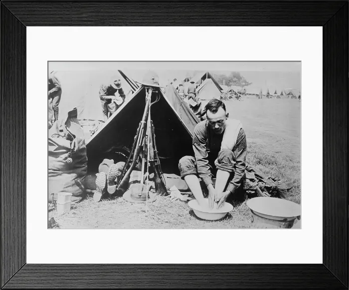 Framed Print : Washing tired feet, 1918. Creator: Bain News Service