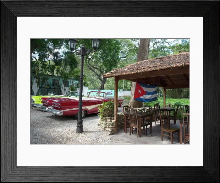Framed Print : Old American cars and the Cuban flag at the Bosque, Havana, Cuba, 2024. Creator: Ethel Davies Framed Print : Old American cars and the Cuban flag at the Bosque, Havana, Cuba, 2024. Creator: Ethel Davies