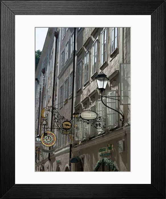Framed Print : Detail view of the traditional signs along an old building on Getreidegasse, Salzburg, Austria, 2022 Creator: Ethel Davies Framed Print : Detail view of the traditional signs along an old building on Getreidegasse, Salzburg, Austria, 2022 Creator: Ethel Davies