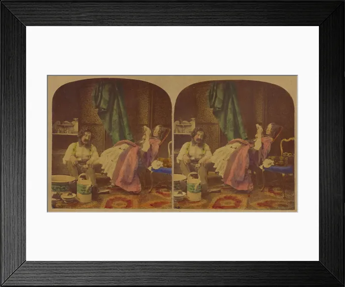 Framed Print : Genre scene: man with bushy moustache seated bathing feet of woman seated reading a book, about 1860 Creator: Joseph John Elliott Framed Print : Genre scene: man with bushy moustache seated bathing feet of woman seated reading a book, about 1860 Creator: Joseph John Elliott