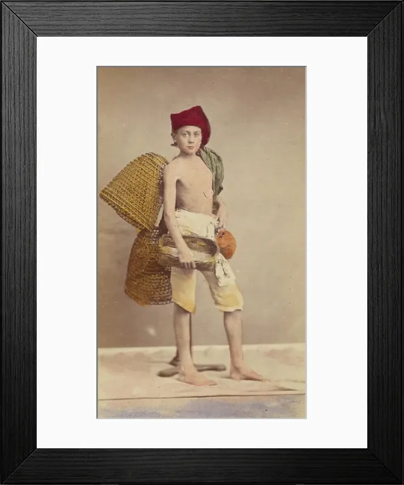 Framed Print : Unidentified boy wearing native costume with baskets on back and carrying a water jug... 1870-1875. Creator: Giorgio Conrad Framed Print : Unidentified boy wearing native costume with baskets on back and carrying a water jug... 1870-1875. Creator: Giorgio Conrad