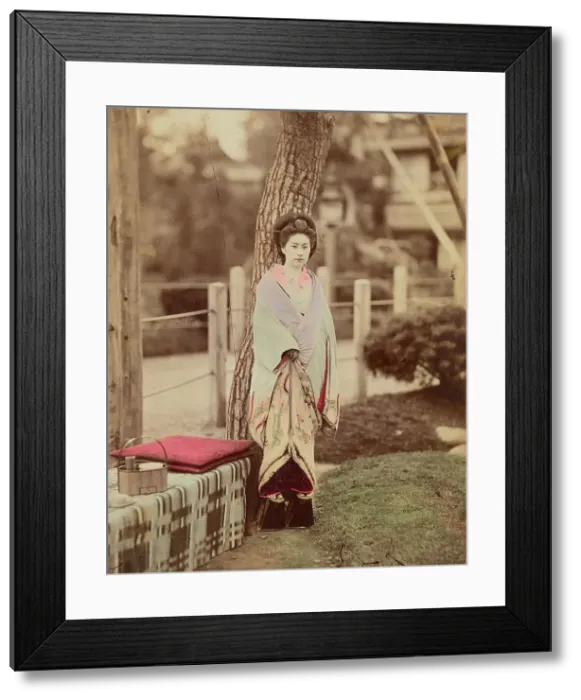 Framed Print : Girl standing near tree, 1870s-1890s. Creator: Kusakabe Kimbei Framed Print : Girl standing near tree, 1870s-1890s. Creator: Kusakabe Kimbei