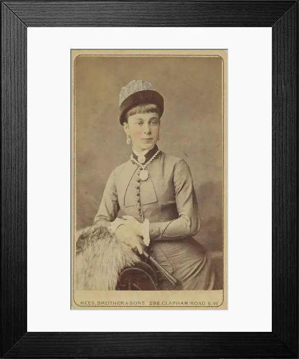 Framed Print : Unidentified woman standing, holding a fan, 1879. Creator: David Rees & Brother & Son Framed Print : Unidentified woman standing, holding a fan, 1879. Creator: David Rees & Brother & Son