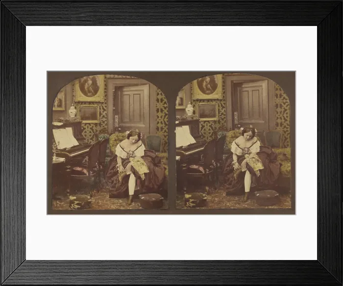Framed Print : Innocence: woman seated in parlor fixing her shoe, about 1860. Creator: Unknown Framed Print : Innocence: woman seated in parlor fixing her shoe, about 1860. Creator: Unknown