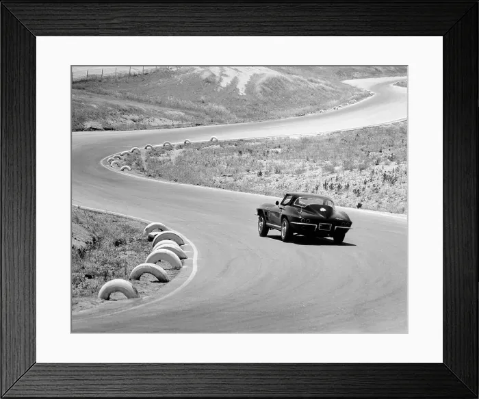 Framed Print : 1964 Chevrolet Corvette Stingray on a winding racetrack, (c1964?) Framed Print : 1964 Chevrolet Corvette Stingray on a winding racetrack, (c1964?)