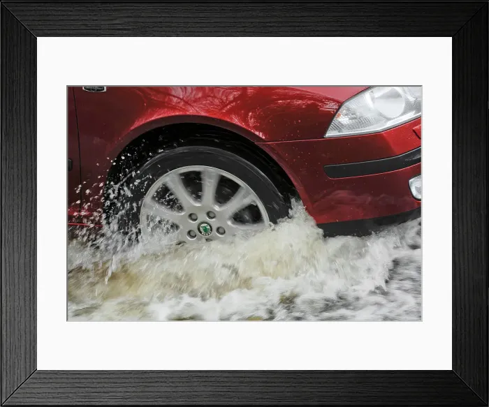 Framed Print : Car driving through flood Framed Print : Car driving through flood