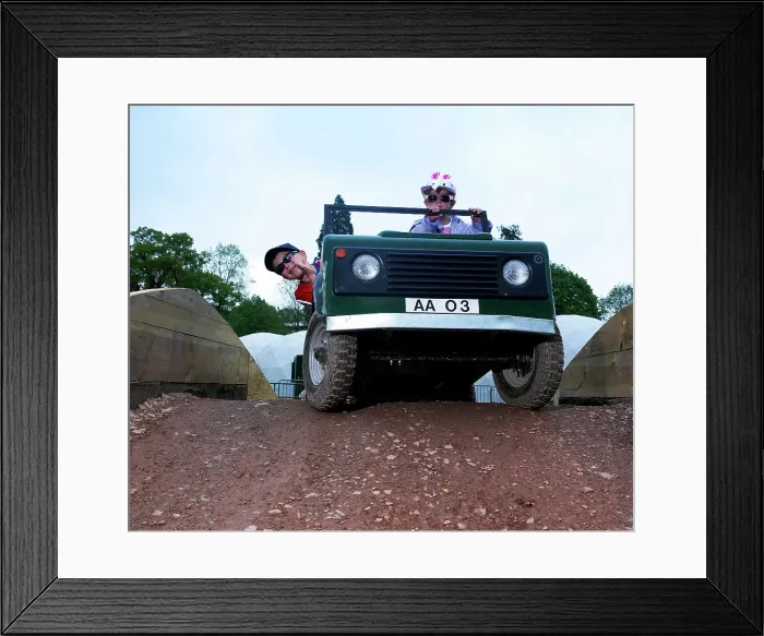 Framed Print : Child driving a toy Land Rover Framed Print : Child driving a toy Land Rover