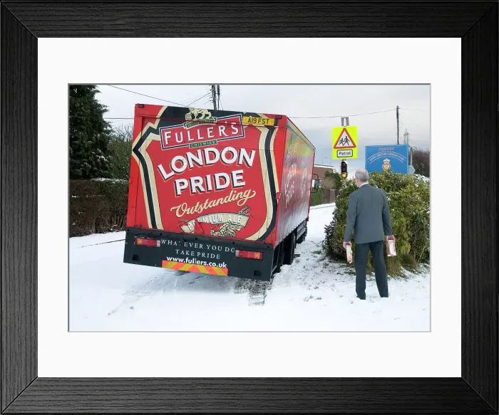Framed Print : London Pride Brewery lorry stuck in snow 2009 Framed Print : London Pride Brewery lorry stuck in snow 2009