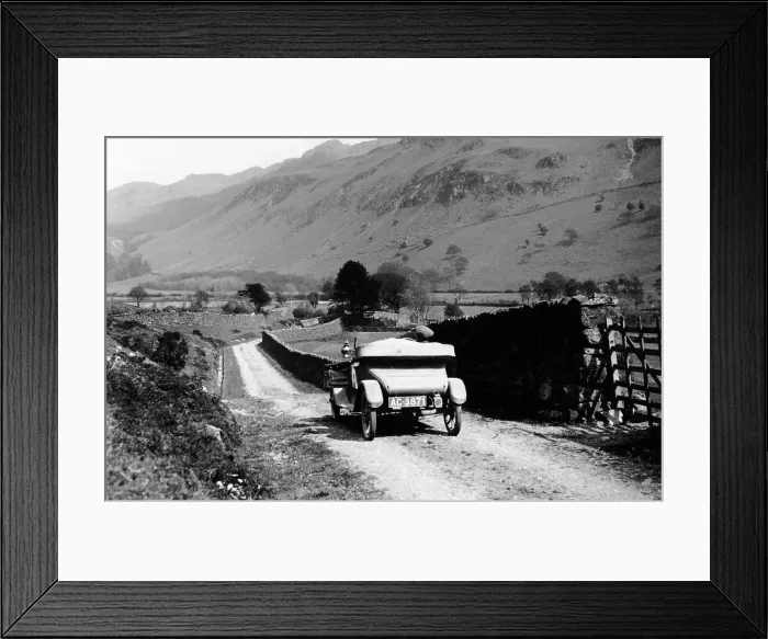 Framed Print : A vintage car travelling along a lane through the Lake District, Cumbria, 1920s Framed Print : A vintage car travelling along a lane through the Lake District, Cumbria, 1920s