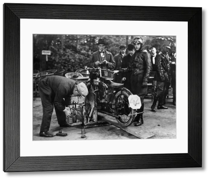 Framed Print : Karl Burlage having his Norton bike weighed for a TT competition Framed Print : Karl Burlage having his Norton bike weighed for a TT competition