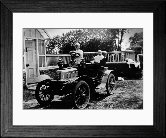Framed Print : A child at the wheel of a De Dion Bouton car, 1903 Framed Print : A child at the wheel of a De Dion Bouton car, 1903