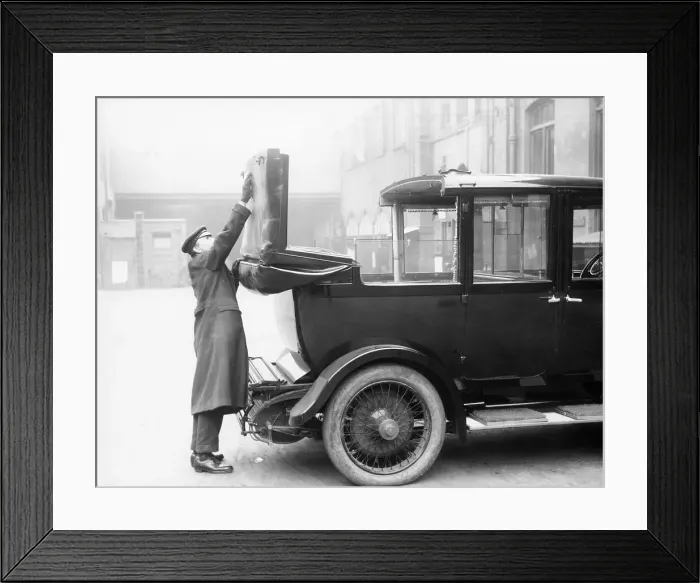 Framed Print : Chauffeur with a partly convertible Daimler