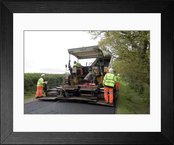 Framed Print : Road resurfacing work repairing potholes Framed Print : Road resurfacing work repairing potholes