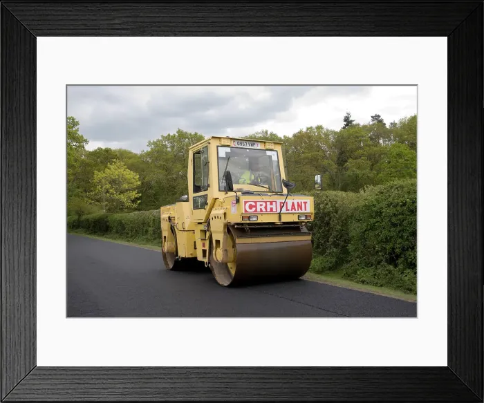 Framed Print : Road resurfacing work repairing potholes Framed Print : Road resurfacing work repairing potholes