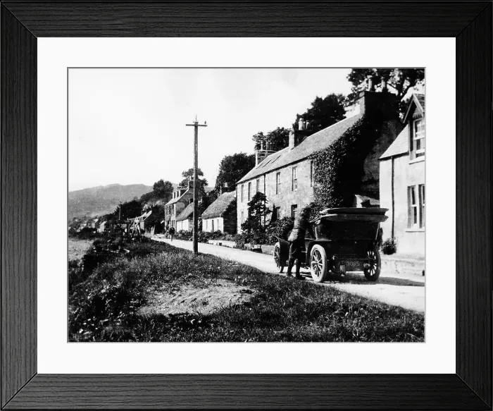 Framed Print : A man by his car in a village lane, 1900 Framed Print : A man by his car in a village lane, 1900
