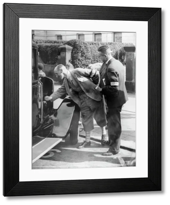 Framed Print : A judge inspecting a car at the Southport Rally, 1928 Framed Print : A judge inspecting a car at the Southport Rally, 1928