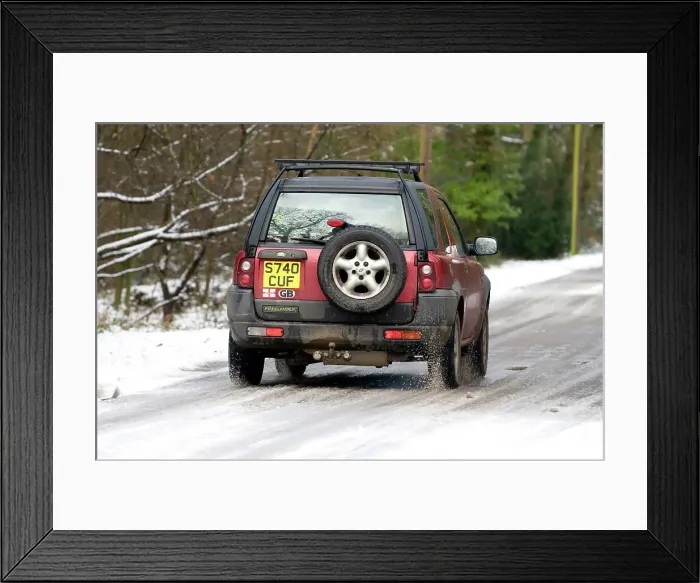 Framed Print : 1998 Land Rover Freelander driving on icy road 2009 Framed Print : 1998 Land Rover Freelander driving on icy road 2009