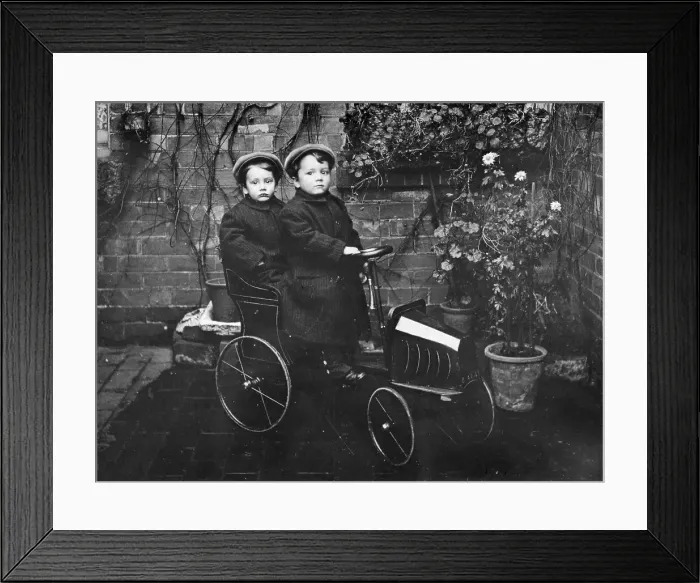 Framed Print : Two boys in a pedal car, (early 20th century?) Framed Print : Two boys in a pedal car, (early 20th century?)